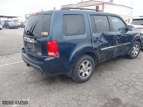 2010 Honda Pilot Touring with VIN 5FNYF4H80AB039371, listed as a IAAI auction lot 41817424 with 202,306 mi miles. Bid and sale history available at carsss.com. Image 4.