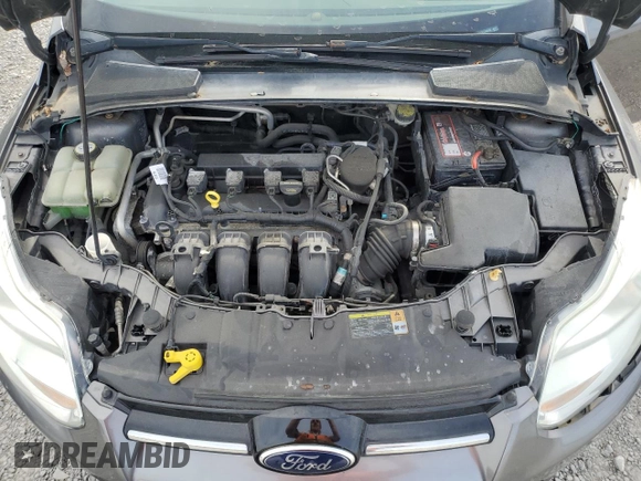 2012 Ford Focus SE with VIN 1FAHP3F27CL335046, listed as a Copart auction lot 55235175 with 128,119 mi miles and Salvage title. Bid and sale history available at DreamBid. Image 11.