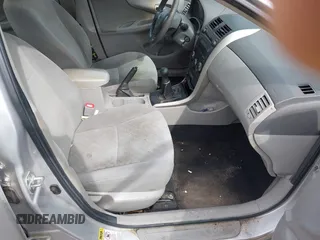 2009 Toyota Corolla with VIN 2T1BU40E99C175172, listed as a IAAI auction lot 42072575 with 176,714 mi miles. Bid and sale history available at carsss.com. Image 5.