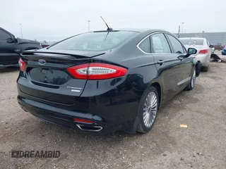 2014 Ford Fusion Titanium with VIN 3FA6P0K9XER364392, listed as a IAAI auction lot 41642439 with 130,302 mi miles and . Bid and sale history available at DreamBid. Image 4.