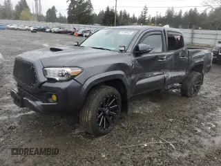 2021 Toyota Tacoma SR z VIN 3TMCZ5AN9MM385605, wystawiony jako Copart lot #52186425 z przebiegiem 65 989 mil mil oraz Szkoda całkowita • Salvage title. Historia ofert i sprzedaży dostępna na DreamBid. Obrazek 1.