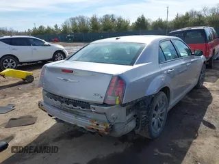 2014 Chrysler 300 with VIN 2C3CCAGG7EH255782, listed as a IAAI auction lot 41689454 with 148,912 mi miles. Bid and sale history available at carsss.com. Image 4.