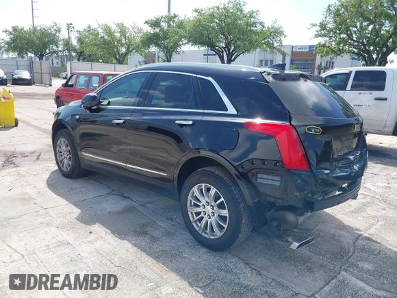 2017 Cadillac XT5 FWD with VIN 1GYKNARS6HZ123114, listed as a IAAI auction lot 41933928 with 166,213 mi miles. Bid and sale history available at carsss.com. Image 3.