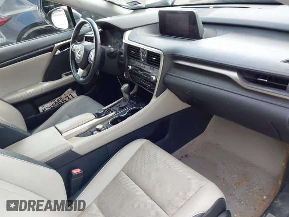 2016 Lexus RX 350 z VIN 2T2ZZMCA4GC032034, wystawiony jako IAAI lot #42095974 z przebiegiem 57 195 mil mil oraz . Historia ofert i sprzedaży dostępna na DreamBid. Obrazek 5.