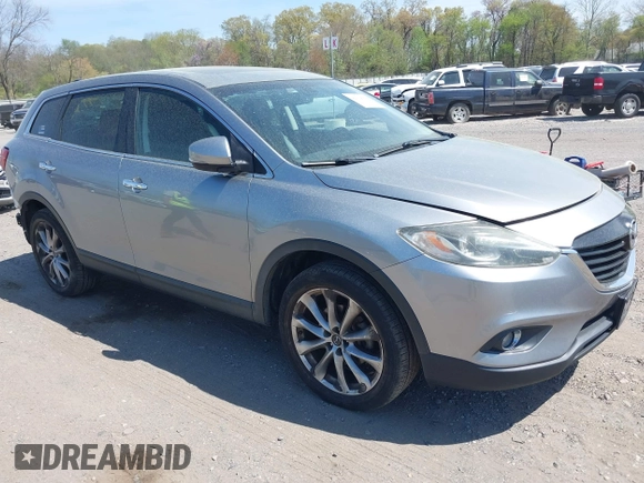 2014 Mazda CX-9 Grand Touring z VIN JM3TB3DV4E0429428, wystawiony jako IAAI lot #42094028 z przebiegiem 147 294 mil mil oraz . Historia ofert i sprzedaży dostępna na DreamBid. Obrazek 1.