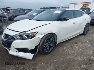 2017 Nissan Maxima SL with VIN 1N4AA6AP2HC421962, listed as a IAAI auction lot 42357374 with 127,450 mi miles and . Bid and sale history available at DreamBid. Image 2.