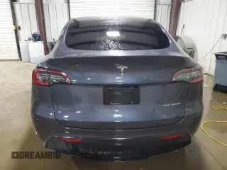 2022 Tesla Model Y Long Range with VIN 7SAYGDEE7NF422837, listed as a Copart auction lot 55271665 with 52,976 mi miles and Clean Title. Bid and sale history available at DreamBid. Image 6.