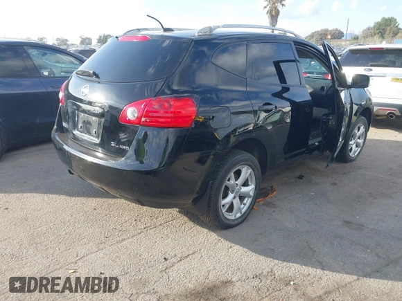 2009 Nissan Rogue S with VIN JN8AS58VX9W193039, listed as a IAAI auction lot 41556451 with 132,814 mi miles and . Bid and sale history available at DreamBid. Image 4.