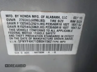 2013 Honda Pilot EX-L with VIN 5FNYF4H71DB041562, listed as a IAAI auction lot 41819184 with 136,014 mi miles and . Bid and sale history available at DreamBid. Image 9.