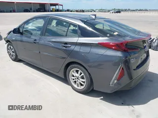 2021 Toyota Prius LE with VIN JTDKAMFP3M3193640, listed as a IAAI auction lot 42023593 with 17,841 mi miles and . Bid and sale history available at DreamBid. Image 3.
