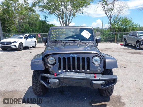 2017 Jeep Wrangler Unlimited Rubicon Recon with VIN 1C4HJWFG2HL560846, listed as a IAAI auction lot 42532745 with 101,285 mi miles and . Bid and sale history available at DreamBid. Image 6.