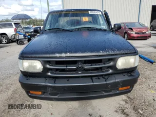 1996 Mazda B-Series 2WD Truck SE with VIN 4F4CR16U5TTM08135, listed as a Copart auction lot 86593474 with 127,430 mi miles and Salvage Title. Bid and sale history available at carsss.com. Image 5.
