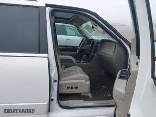 2015 Lincoln Navigator L with VIN 5LMJJ3JT7FEJ05280, listed as a IAAI auction lot 41476190 with 124,580 mi miles. Bid and sale history available at carsss.com. Image 5.