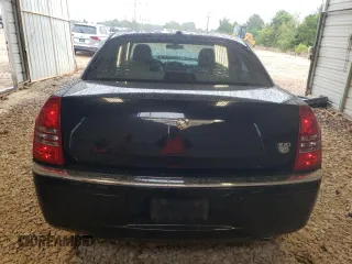 2006 Chrysler 300 C with VIN 2C3KA63H66H400714, listed as a Copart auction lot 71831914 with 288,577 mi miles and Salvage Title. Bid and sale history available at carsss.com. Image 6.