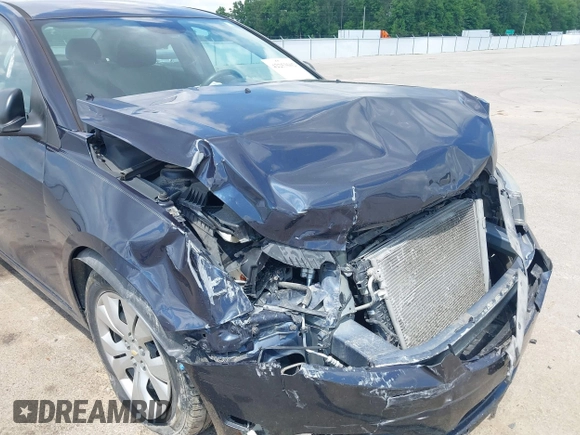2014 Chevrolet Cruze LS with VIN 1G1PA5SH6E7446155, listed as a IAAI auction lot 42253602 with 142,833 mi miles and . Bid and sale history available at DreamBid. Image 6.