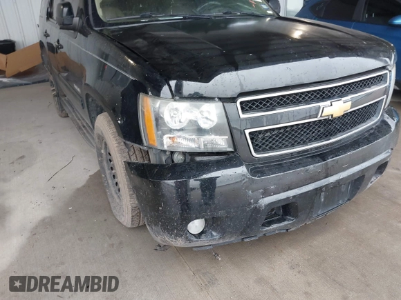 2014 Chevrolet Tahoe LT z VIN 1GNSCBE01ER190342, wystawiony jako IAAI lot #41578109 z przebiegiem 204 781 mil mil oraz . Historia ofert i sprzedaży dostępna na DreamBid. Obrazek 6.