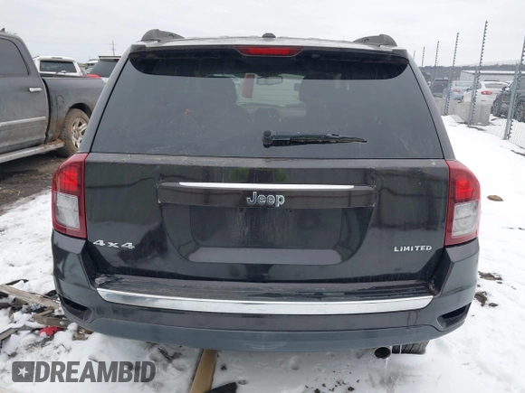 2014 Jeep Compass Limited with VIN 1C4NJDCB6ED549614, listed as a IAAI auction lot 41595768 with 114,472 mi miles. Bid and sale history available at carsss.com. Image 16.