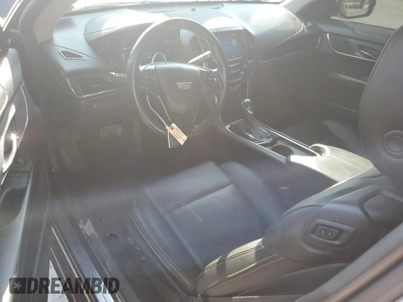 2015 Cadillac ATS Standard AWD z VIN 1G6AG1RX9F0141957, wystawiony jako Copart lot #59305055 z przebiegiem 72 244 mil mil oraz Szkoda całkowita • Salvage title. Historia ofert i sprzedaży dostępna na DreamBid. Obrazek 8.