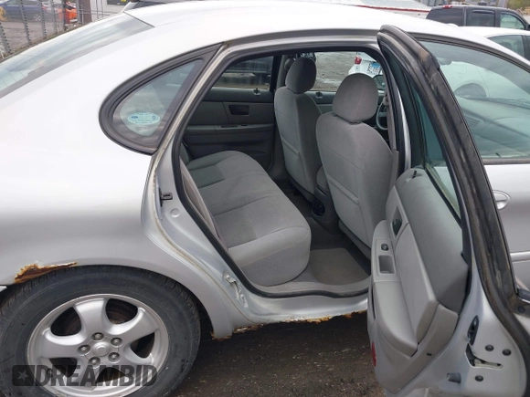 2004 Ford Taurus SES with VIN 1FAFP55234G155531, listed as a IAAI auction lot 42024338 with 138,927 mi miles and . Bid and sale history available at DreamBid. Image 8.