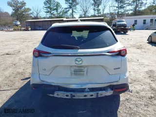 2020 Mazda CX-9 Grand Touring with VIN JM3TCADY5L0413201, listed as a IAAI auction lot 41462802 with 164,625 mi miles. Bid and sale history available at carsss.com. Image 16.