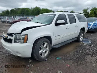 2014 Chevrolet Suburban LT z VIN 1GNSCJE0XER117660, wystawiony jako Copart lot #57461975 z przebiegiem Nie podano mil oraz Szkoda całkowita • Salvage title. Historia ofert i sprzedaży dostępna na DreamBid. Obrazek 1.