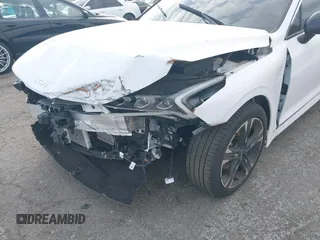 2024 Kia K5 GT-Line z VIN 5XXG64J29RG259036, wystawiony jako IAAI lot #40777274 z przebiegiem 6716 mil mil oraz . Historia ofert i sprzedaży dostępna na DreamBid. Obrazek 6.