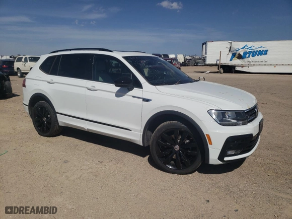 2020 Volkswagen Tiguan SE with VIN 3VV2B7AXXLM145430, listed as a Copart auction lot 51172435 with 52,708 mi miles and Salvage Title. Bid and sale history available at carsss.com. Image 4.