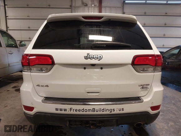 2021 Jeep Grand Cherokee 80th Anniversary with VIN 1C4RJFBG6MC569585, listed as a IAAI auction lot 41341608 with 73,234 mi miles and . Bid and sale history available at DreamBid. Image 16.