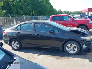 2013 Honda Civic LX z VIN 2HGFB2F5XDH537125, wystawiony jako IAAI lot #42149823 z przebiegiem 166 321 mil mil oraz . Historia ofert i sprzedaży dostępna na DreamBid. Obrazek 13.
