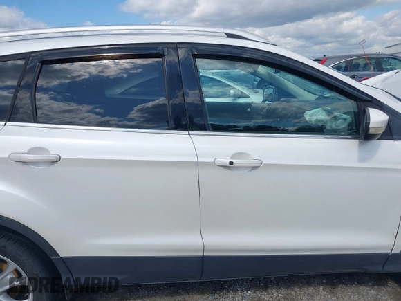 2015 Ford Escape Titanium with VIN 1FMCU0J91FUB13810, listed as a IAAI auction lot 41961798 with 139,265 mi miles. Bid and sale history available at carsss.com. Image 14.
