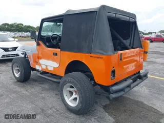1991 Jeep Wrangler with VIN 2J4FY29SXMJ105443, listed as a IAAI auction lot 41964359 with 1,674,923 mi miles. Bid and sale history available at carsss.com. Image 3.