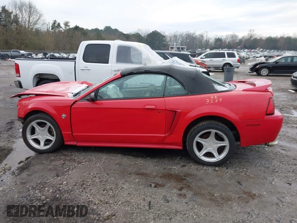 1999 Ford Mustang GT z VIN 1FAFP45XXXF127807, wystawiony jako IAAI lot #41302411 z przebiegiem 156 680 mil mil oraz . Historia ofert i sprzedaży dostępna na DreamBid. Obrazek 15.