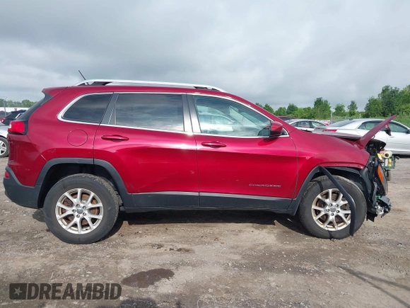2015 Jeep Cherokee Latitude z VIN 1C4PJMCS0FW534959, wystawiony jako IAAI lot #42657381 z przebiegiem 114 577 mil mil oraz . Historia ofert i sprzedaży dostępna na DreamBid. Obrazek 14.