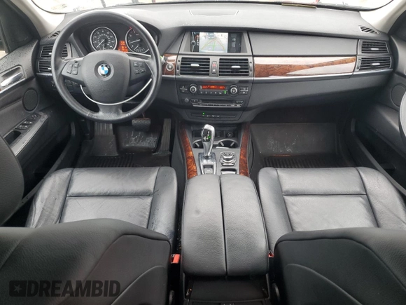 2012 BMW X5 35i with VIN 5UXZV4C57CL747717, listed as a Copart auction lot 63003135 with 135,999 mi miles and Clean title. Bid and sale history available at DreamBid. Image 8.