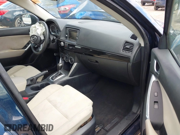 2015 Mazda CX-5 Sport with VIN JM3KE4BY3F0503011, listed as a IAAI auction lot 41973501 with 191,064 mi miles and . Bid and sale history available at carsss.com. Image 5.