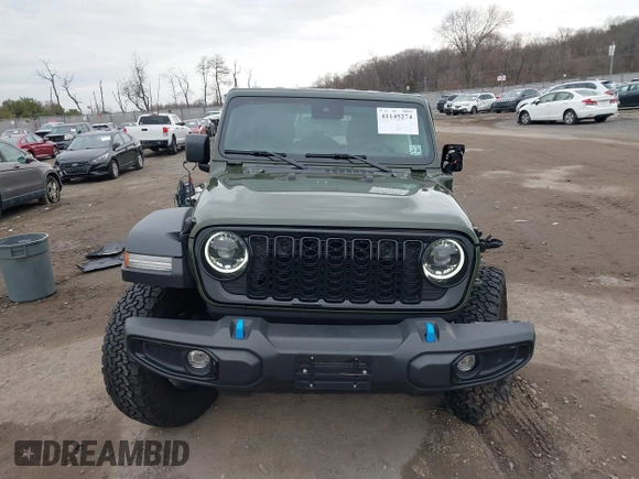 2024 Jeep Wrangler Willys z VIN 1C4RJXN64RW163089, wystawiony jako IAAI lot #41145274 z przebiegiem 31 869 mil mil oraz . Historia ofert i sprzedaży dostępna na DreamBid. Obrazek 12.