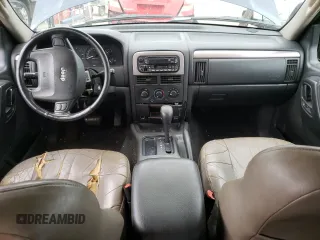 2002 Jeep Grand Cherokee z VIN 1J4GX38S42C229150, wystawiony jako Copart lot #72586834 z przebiegiem 201 103 mil mil oraz Szkoda całkowita • Salvage title. Historia ofert i sprzedaży dostępna na DreamBid. Obrazek 8.