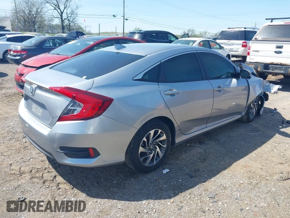 2018 Honda Civic EX with VIN 19XFC2F7XJE015793, listed as a IAAI auction lot 41991788 with 115,137 mi miles and . Bid and sale history available at DreamBid. Image 4.