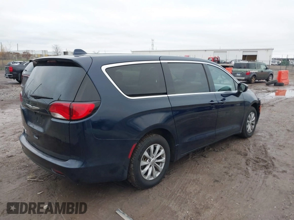 2017 Chrysler Pacifica Touring with VIN 2C4RC1DG3HR592796, listed as a IAAI auction lot 40941158 with 157,291 mi miles and . Bid and sale history available at DreamBid. Image 4.