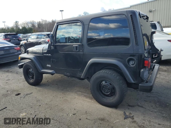 2002 Jeep Wrangler SE with VIN 1J4FA29P82P732805, listed as a Copart auction lot 86017044 with 138,679 mi miles and Salvage Title. Bid and sale history available at DreamBid. Image 2.