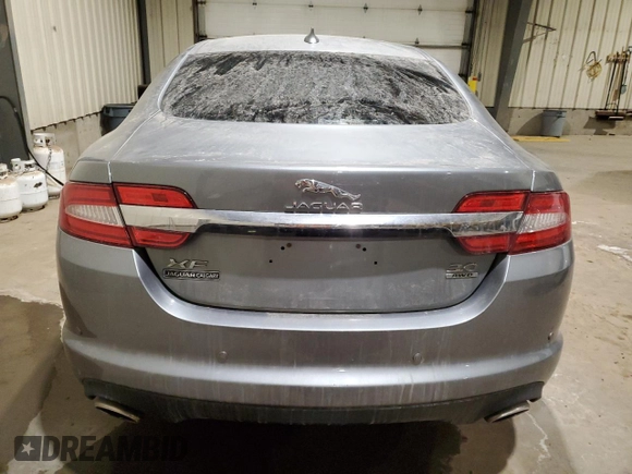 2015 Jaguar XF with VIN SAJXJ0EF1F8U48283, listed as a Copart auction lot 81004054 with 77,828 mi miles and Clean Title. Bid and sale history available at DreamBid. Image 6.