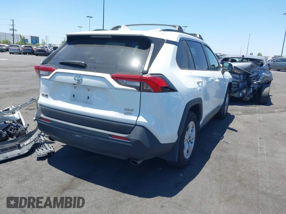 2019 Toyota RAV4 XLE with VIN JTMP1RFV8KD025971, listed as a IAAI auction lot 42673361 with 69,241 mi miles and . Bid and sale history available at DreamBid. Image 4.