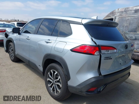 2023 Toyota Corolla Cross Hybrid S with VIN 7MUFBABG1PV014992, listed as a IAAI auction lot 42202656 with 18,913 mi miles and . Bid and sale history available at DreamBid. Image 3.