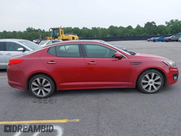 2012 Kia Optima SX z VIN 5XXGR4A65CG010749, wystawiony jako IAAI lot #42424921 z przebiegiem 187 454 mil mil oraz . Historia ofert i sprzedaży dostępna na DreamBid. Obrazek 13.