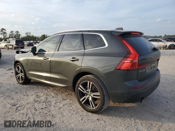 2018 Volvo XC60 Momentum with VIN LYV102RK0JB106389, listed as a Copart auction lot 82677454 with 114,832 mi miles and Salvage Title. Bid and sale history available at carsss.com. Image 2.
