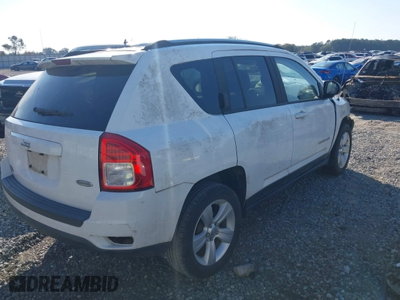 2012 Jeep Compass Latitude with VIN 1C4NJCEA2CD706809, listed as a IAAI auction lot 40956063 with 159,976 mi miles and . Bid and sale history available at carsss.com. Image 4.