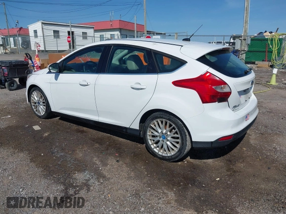 2012 Ford Focus SEL with VIN 1FAHP3M21CL413436, listed as a IAAI auction lot 42011706 with 392,754 mi miles. Bid and sale history available at carsss.com. Image 3.