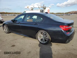 2016 BMW 7 Series 750i xDrive с VIN WBA7F2C53GG420706, выставлен на аукционе Copart как лот 76697534 с пробегом 59 885 миль миль и Чистый • Clean title. История ставок и продаж доступна на DreamBid. Изображение 2.