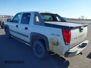 2004 Chevrolet Avalanche Z71 with VIN 3GNEK12T54G107437, listed as a IAAI auction lot 42037726 with 124,166 mi miles. Bid and sale history available at carsss.com. Image 3.