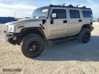 2003 Hummer H2 with VIN 5GRGN23U93H132284, listed as a Copart auction lot 78701904 with 153,171 mi miles and Non Repairable. Bid and sale history available at carsss.com. Image 1.